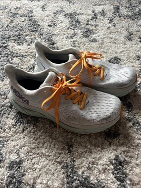 Hoka Clifton 8 Women's Light Gray Running Shoes with Orange Laces and Mint Sole
